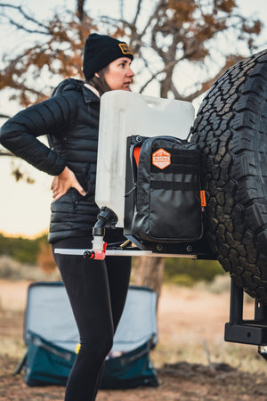 swing out tire carrier water mount and trail pouch
