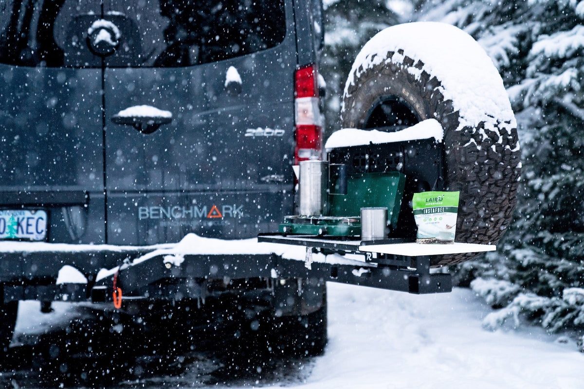 Mercades swing out hitch rack tire carrier with drop down camp table