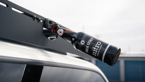 sherpa bottle opener in use opening bottle