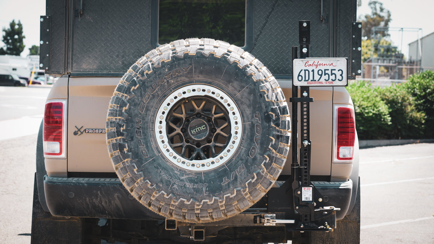 ram 2500 swing out tire carrier hi lift